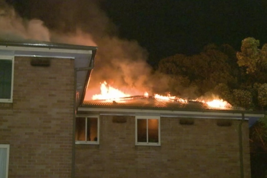 At least 20 people have been rescued from a burning unit block in Villawood.