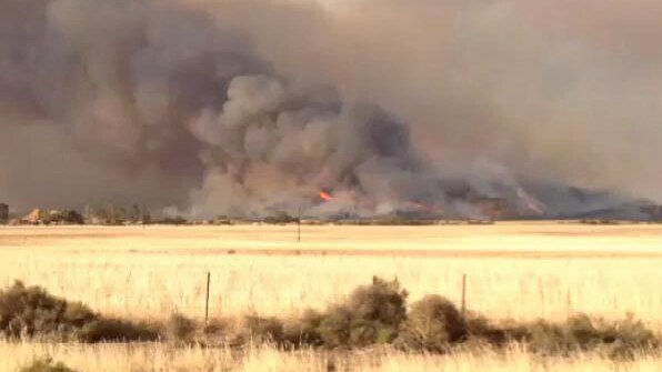 Thick smoke blankets the southern Flinders Ranges as a bushfire burns at Bangor.
