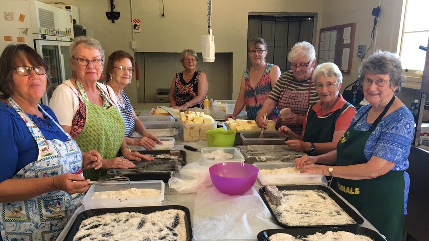 group of women making lamingtons in the Cardross community hall