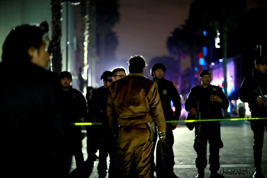 mariachi musician observes a crime scene