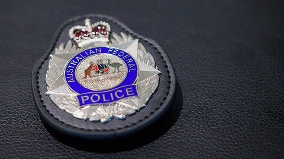 a federal police badge