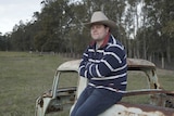 Farmer Josh Gilbert standing on his family's cattle farm in the Gloucester region in NSW for a story about farmers and climate.