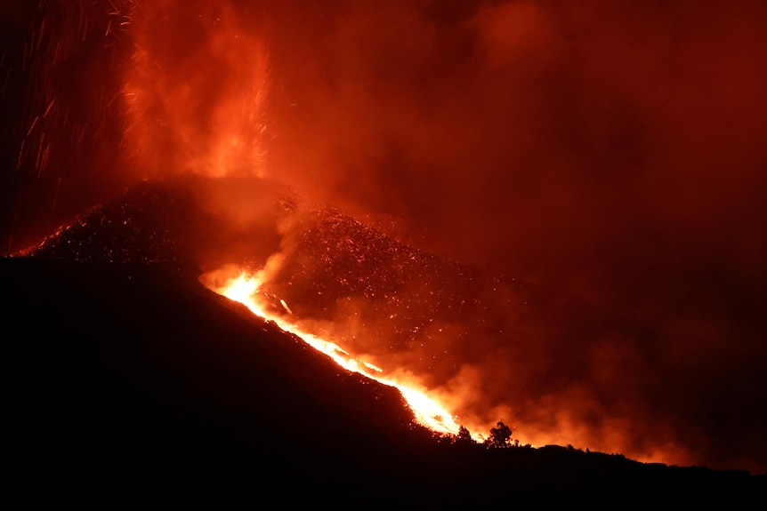 a volcano erupts 