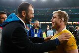 Wallabies coach Michael Cheika and David Pocock after the Rugby World Cup semi-final against Argentina