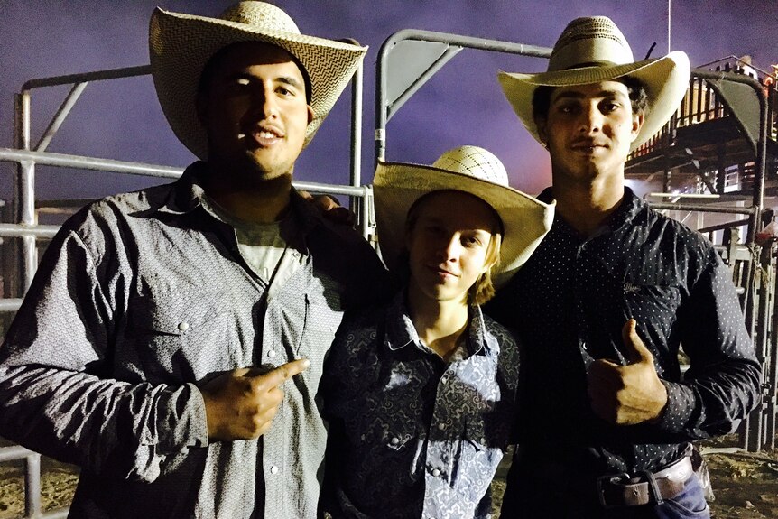 Haider Alhasnawi stands with his rodeo mates Trevor Casey and Eli Bee.