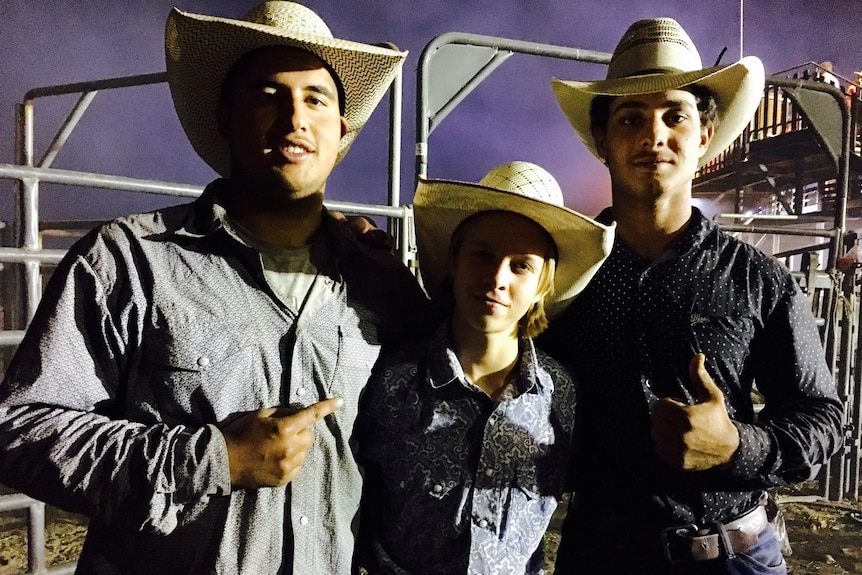 Haider Alhasnawi stands with his rodeo mates Trevor Casey and Eli Bee.