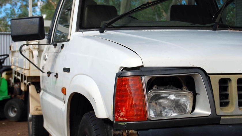 A headlight is damaged on a ute that allegedly hit a three-year-old in Alice Springs