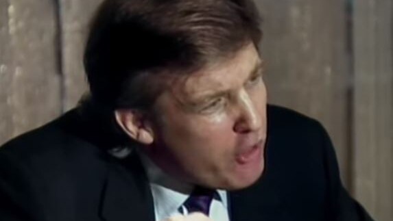 Donald Trump points as he gives an interview on PBS in 1989.