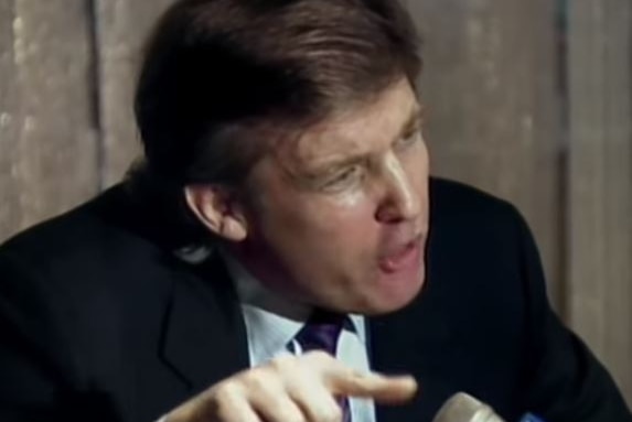 Donald Trump points as he gives an interview on PBS in 1989.
