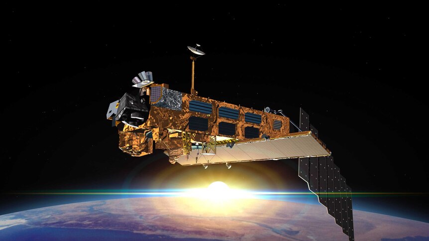 The Sun is emerging from behind the European Space Agency satellite Envisat
