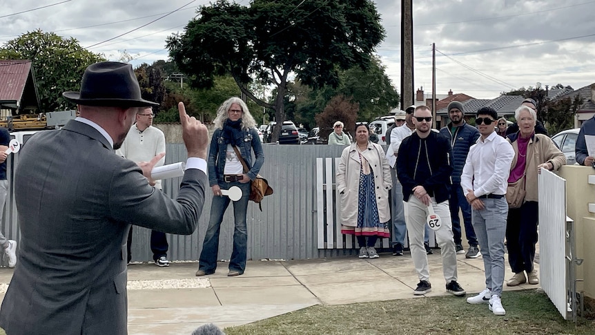 An auction at a home in suburban Adelaide.