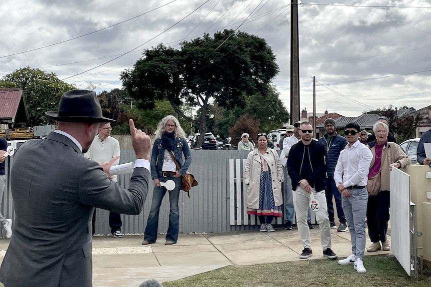 An auction at a home in suburban Adelaide.