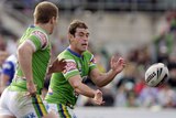 Terry Campese passes against the Dogs