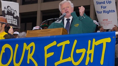 Senator Ted Kennedy addresses a rally by union workers in 2003