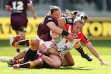 Holli Wheeler is tackled during the round one of the NRLW 