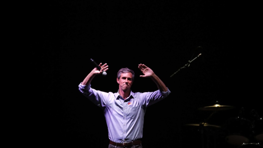 Democto a crratic senate candidate Beto O'Rourke waves to a crowd after conceding his race