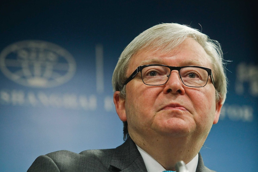 Kevin Rudd looks serious.