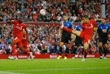 Christian Benteke about to score his first goal for Liverpool