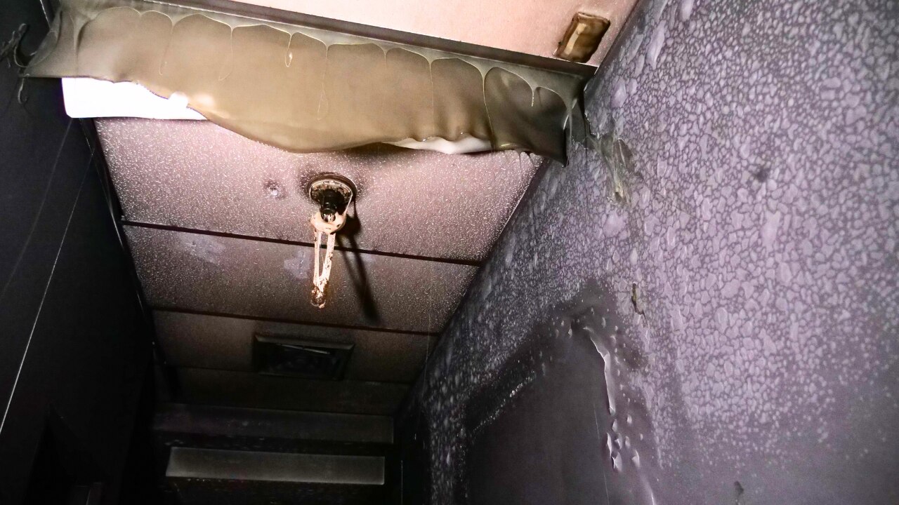 Photos show damage caused in alleged arson attack on Gosford law firm ...