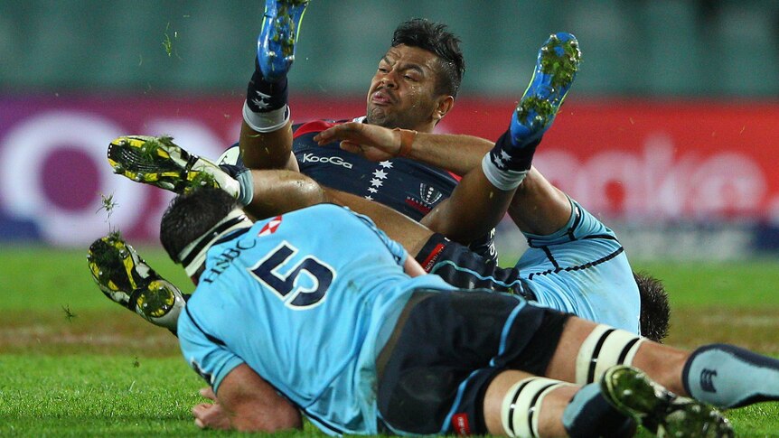Dangerous tackle ... the SANZAR committee ruled that Beale had been lifted and dropped.