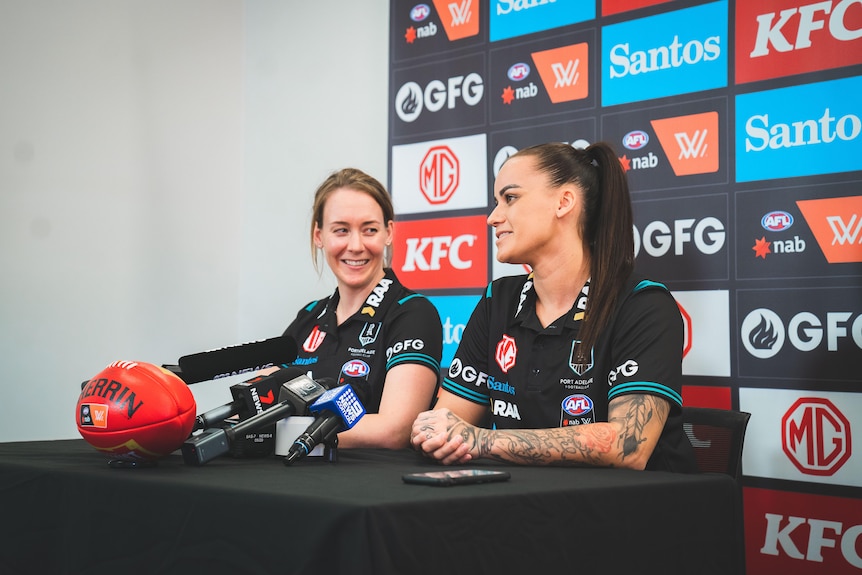Lauren Arnell and Gemma Houghton at a press conference