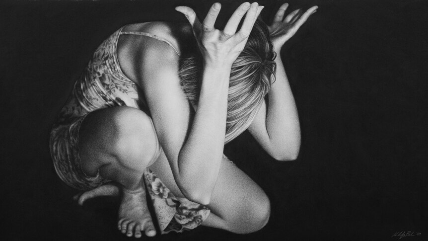 A work from Kim Buck's series, Conatus, featuring an anonymous girl crouching, as if in despair