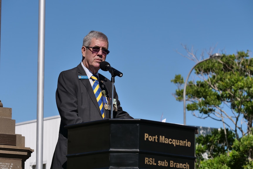 A man standing at a podium.