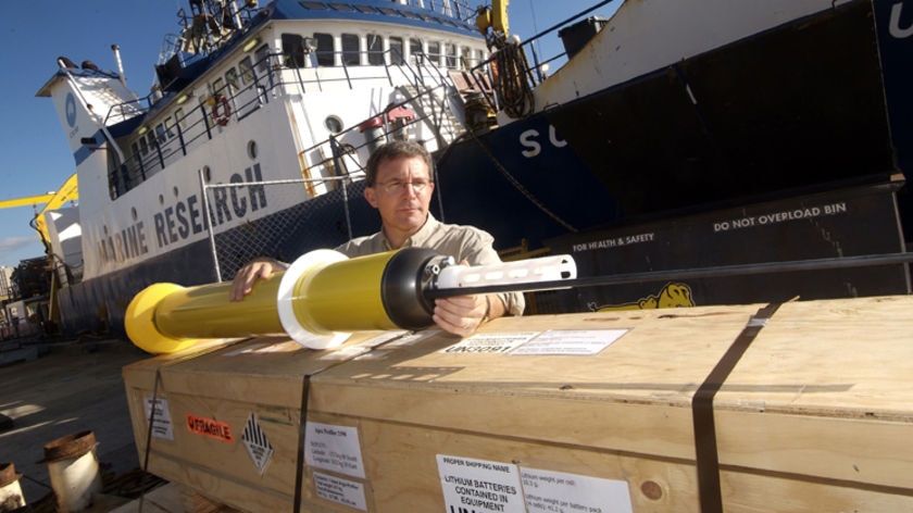 CSIRO oceanographer Stuart Rintoul with a robotic float.
