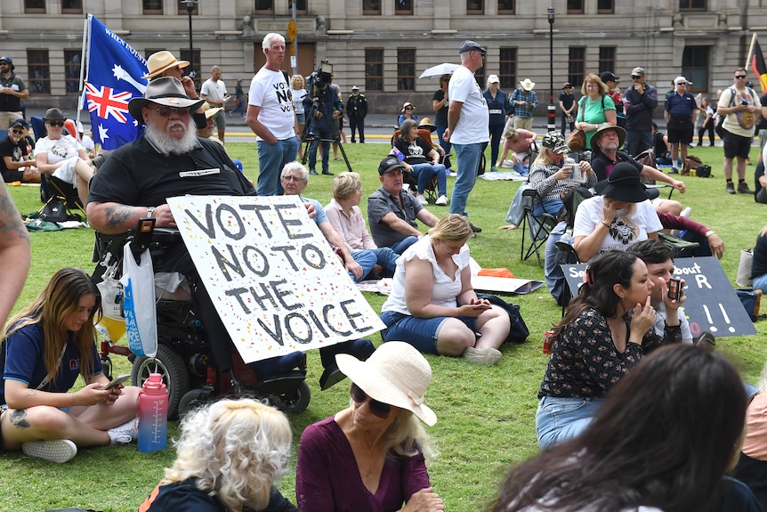 People take part in a rally against the voice to parliament in Brisbane