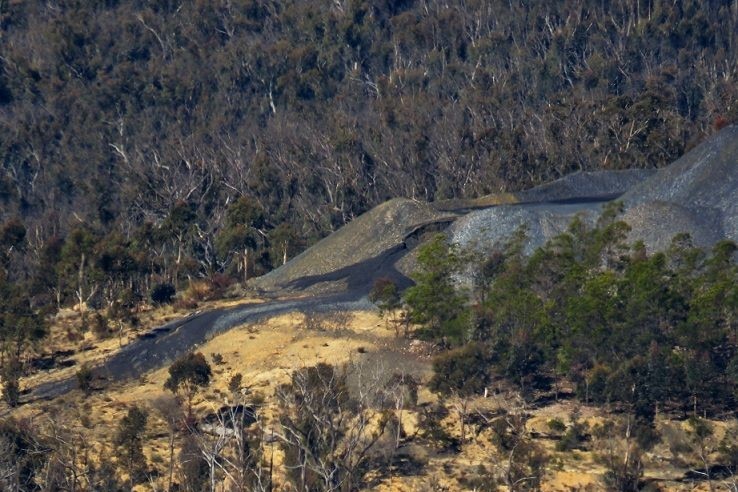 Bushland showing the collapse of the dam.