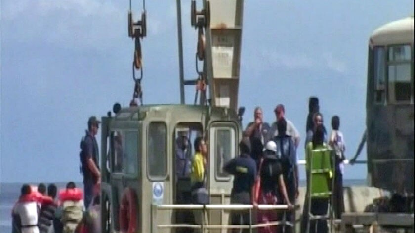 The most recent group of suspected asylum seekers arrived at Christmas Island having evaded detection by customs.