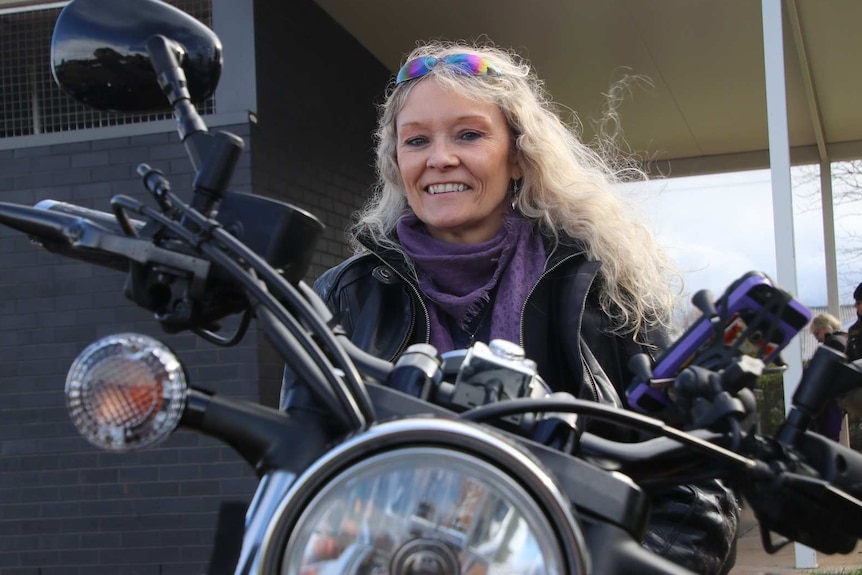 Cheree Wisniewski with her motorcycle.