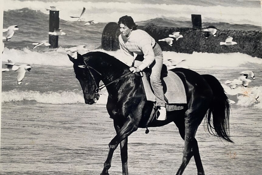 Wendy Smith riding on the beach