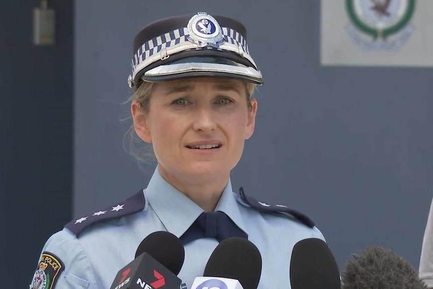 A female constable in a blue uniform