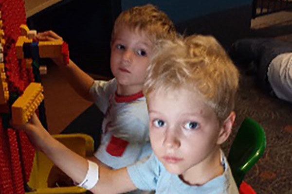 Ethan (front) and Timothy Van Lonkhuyzen are travelling with their father.