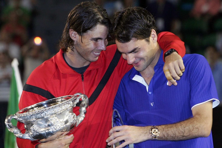 Rafael Nadal of Spain (left) embraces Roger Federer after the 2009 Australian Open men's final.