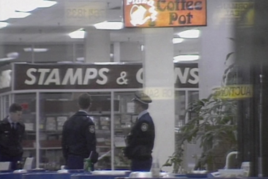 Police officers in blue uniforms after Strathfield Plaza 
