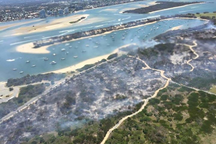 An aerial view of a vegetation fire that broke out at the Gold Coast's Southport Spit