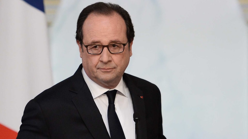 Francois Hollande makes a statement after the security meeting.