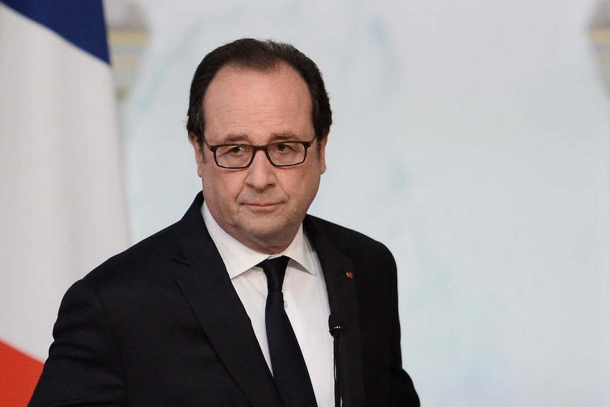 Francois Hollande makes a statement after the security meeting.