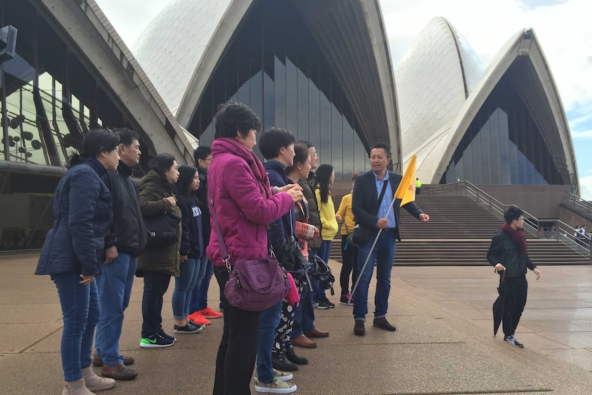 Chinese tourists by the Sydney Opera House