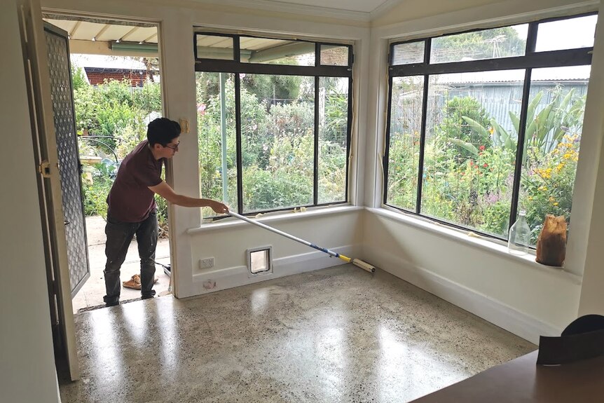 Carmelo polished the concrete floors in the kitchen by hand.