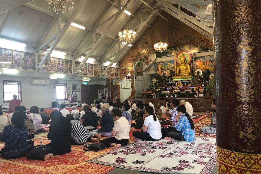 Worshippers at Watt Khemarangsaram in Sydney.