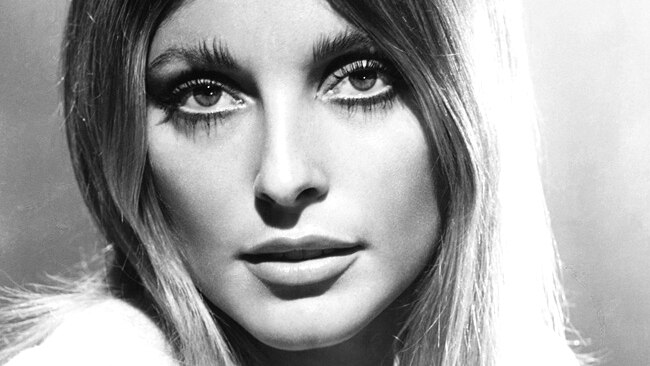 A black and white glamour headshot of Sharon Tate. Her hair is down. Her eye makeup is on fleek.