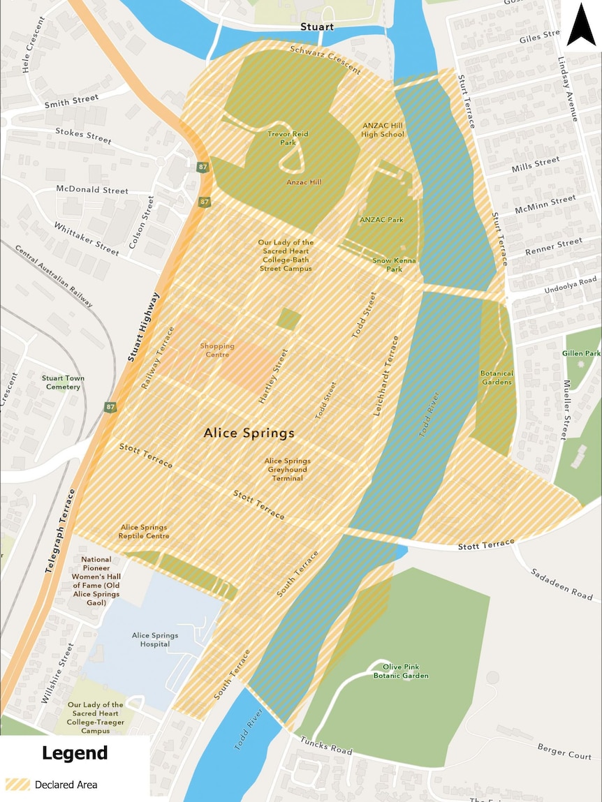 A photo showing a map of Alice Springs with a shaded area marking a curfew region.