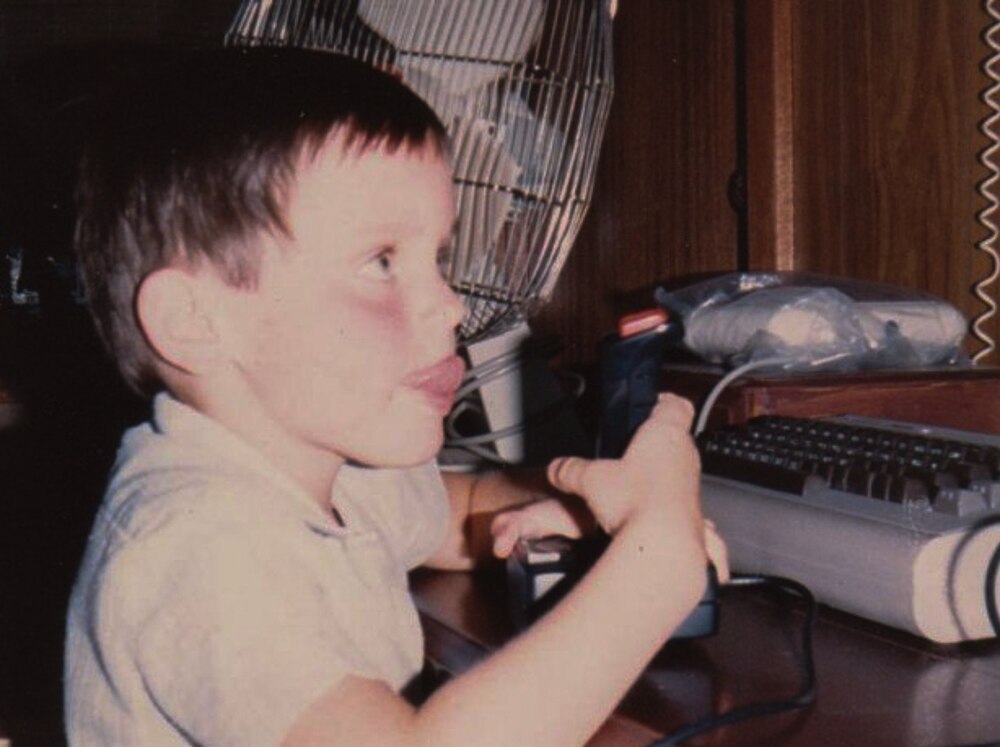 Chad Habel playing his Commodore 64 micro-computer in the early 80s.
