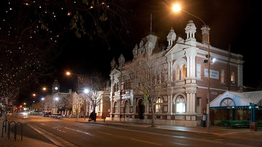 a street in Albury at night.