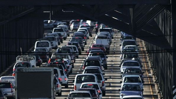 Motorists queue to enter the city via the Iron Cove Bridge in Sydney