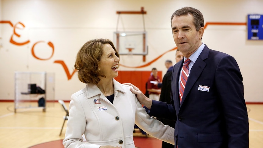 Ralph Northam stands with his arm around his wife Pam.