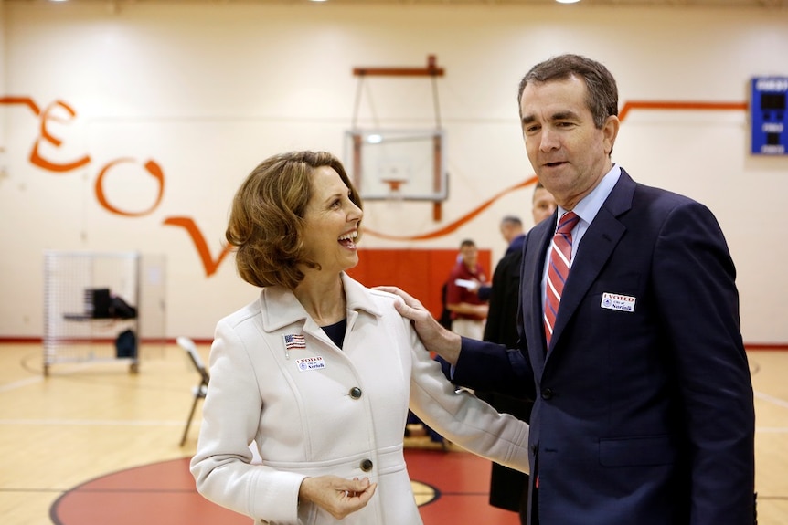 Ralph Northam stands with his arm around his wife Pam.